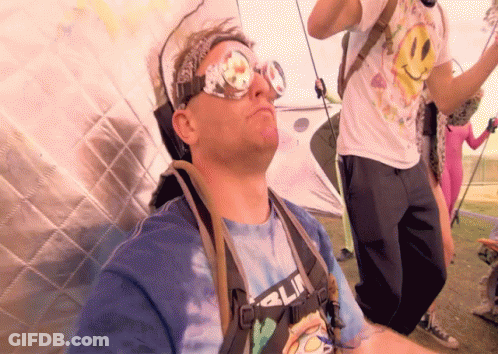 Man In Sunglasses And Tie Dye Shirt GIF