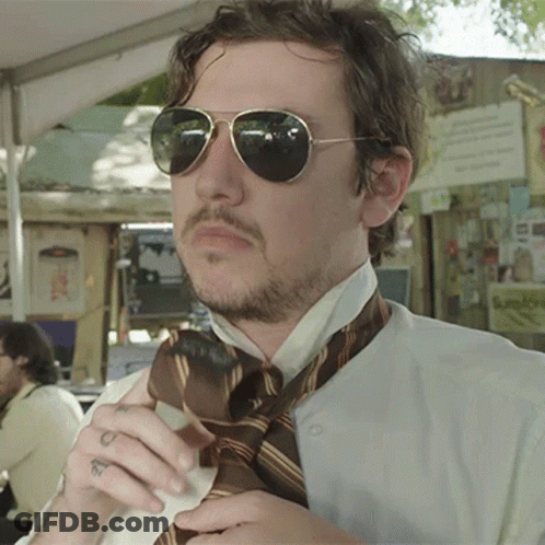 Man In Sunglasses And Tie With Wrist Tattoo GIF