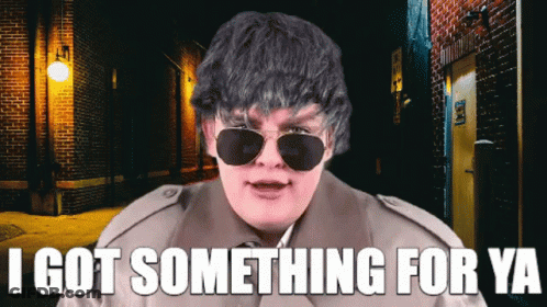 Man In Sunglasses And Trench Coat Says I Got Something For Ya GIF