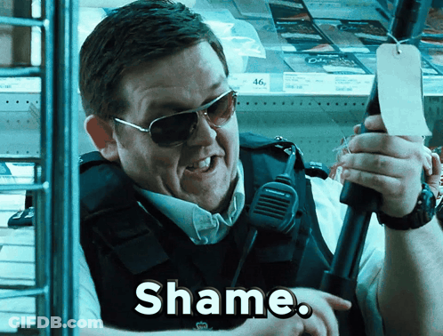 Man In Sunglasses And Vest Holding Microphone Saying Shame GIF
