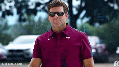 Man In Sunglasses And VT Shirt GIF