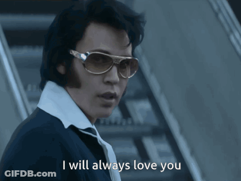 Man In Sunglasses And White Shirt Saying I Will Always Love You GIF