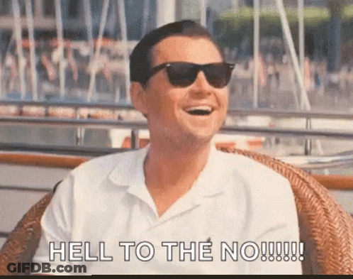 Man In Sunglasses And White Shirt Sitting GIF