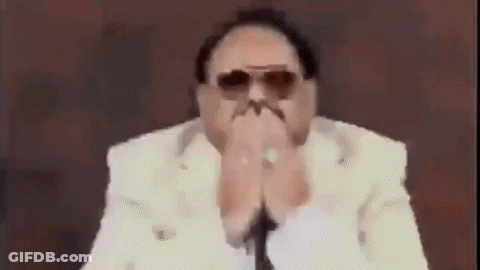 Man In Sunglasses And White Suit Covering Mouth GIF