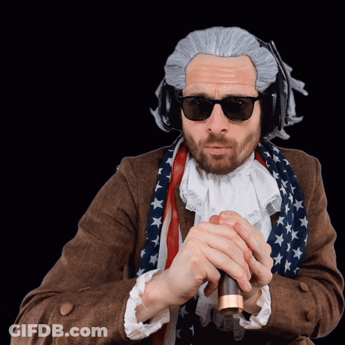 Man In Sunglasses And Wig Holding Cane GIF