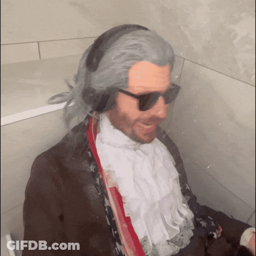Man In Sunglasses And Wig In Bathroom GIF