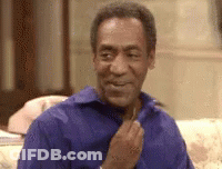 Man In Sunglasses And Yellow Jacket Looking Down GIF