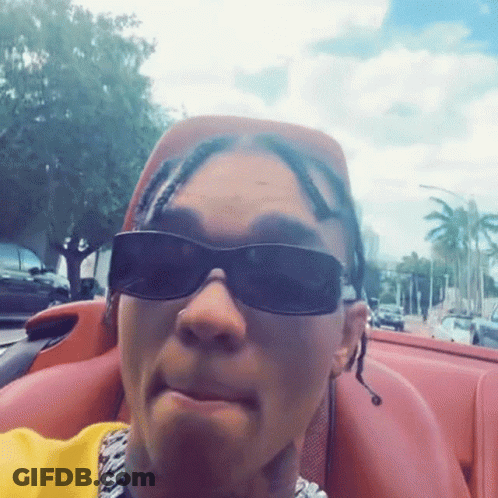 Man In Sunglasses And Yellow Shirt Sitting In Car GIF