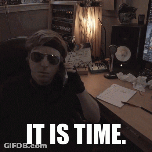 Man In Sunglasses At Desk Saying It Is Time GIF