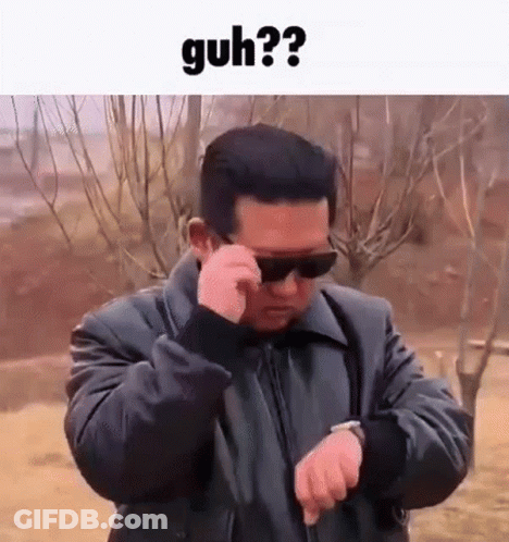 Man In Sunglasses Checking Watch GIF