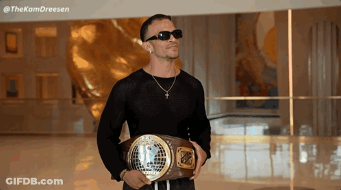 Man In Sunglasses Holding Championship Belt 12 GIF