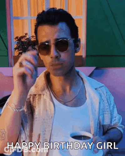 Man In Sunglasses Holding Coffee And Smoking Cigarette GIF