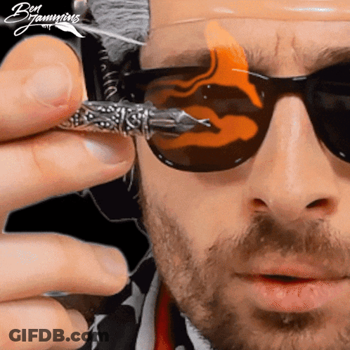 Man In Sunglasses Holding Fountain Pen GIF