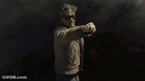 Man In Sunglasses Holding Green Object GIF