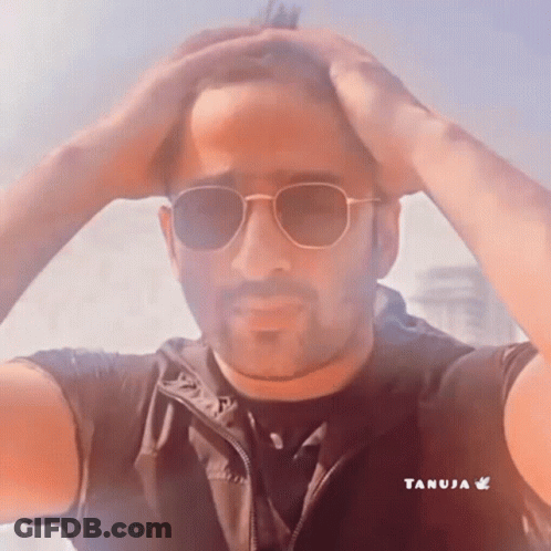 Man In Sunglasses Holding Hand To Forehead GIF