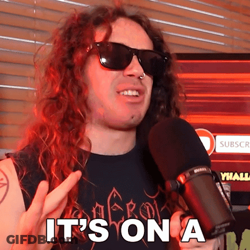 Man In Sunglasses Holding Microphone Saying Its On GIF