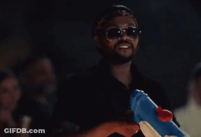 Man In Sunglasses Holding Water Gun GIF
