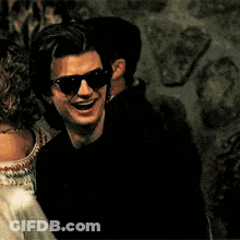 Man In Sunglasses Laughing Holding Red Cup GIF