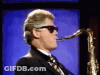 Man In Sunglasses Playing Saxophone GIF