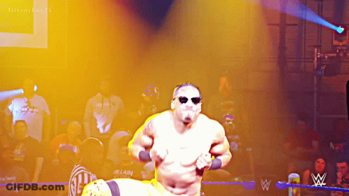 Man In Sunglasses Running In Wrestling Ring GIF