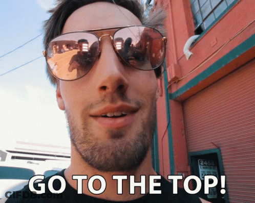 Man In Sunglasses Saying Go To The Top GIF
