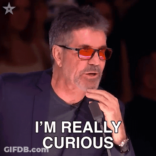 Man In Sunglasses Saying I'm Really Curious GIF