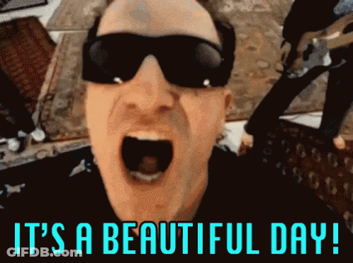 Man In Sunglasses Saying It's A Beautiful Day GIF