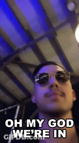 Man In Sunglasses Saying Oh My God We're In GIF