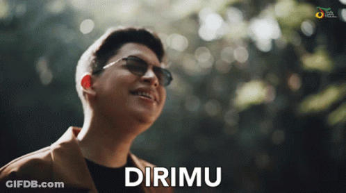 Man In Sunglasses Says Dirimu In Front Of Trees GIF