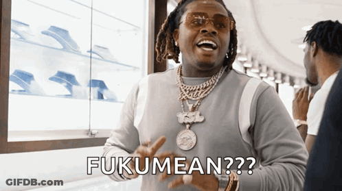 Man In Sunglasses Says Fukumean In Jewelry Store GIF