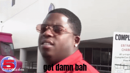 Man In Sunglasses Says Got Damn Bah In Front Of Sign GIF