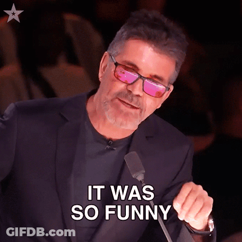 Man In Sunglasses Says It Was So Funny At Microphone GIF