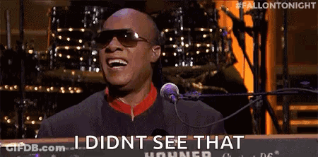 Man In Sunglasses Singing Into Microphone At Keyboard GIF