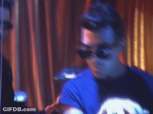 Man In Sunglasses Sitting At Keyboard GIF