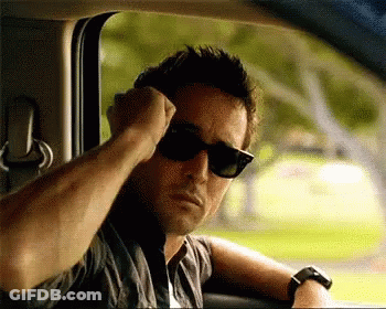 Man In Sunglasses Sitting In Car GIF