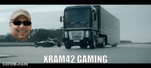 Man In Sunglasses Smiling In Front Of Xram42 Gaming Truck GIF