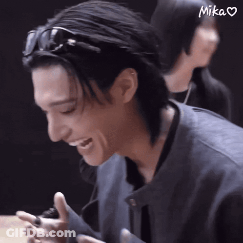 Man In Sunglasses Smiling Saying Mika GIF