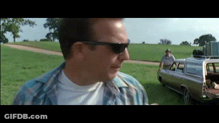 Man In Sunglasses Standing By Car In Field GIF