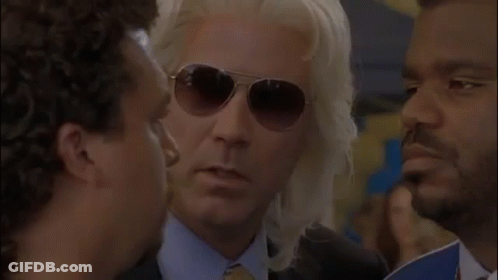Man In Sunglasses Talking To Another Man GIF