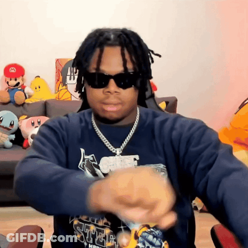 Man In Sunglasses With Nintendo World Shirt GIF