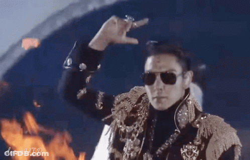 Man In Sunglasses With White Deenavip Statue GIF