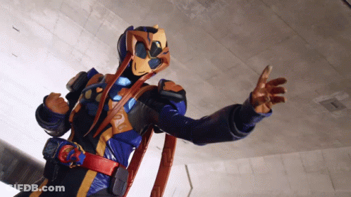 Man In Superhero Costume Arms Outstretched GIF