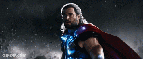 Man In Superhero Costume Blue Lightning Chest GIF