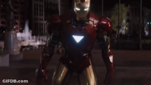 Man In Superhero Costume Close Up GIF