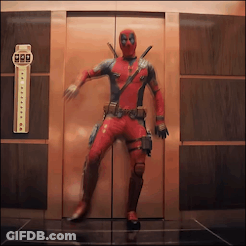 Man In Superhero Costume In Elevator GIF