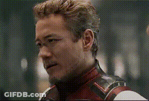 Man In Superhero Costume Looking GIF