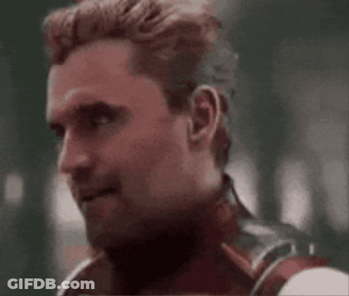 Man In Superhero Costume Making Face GIF