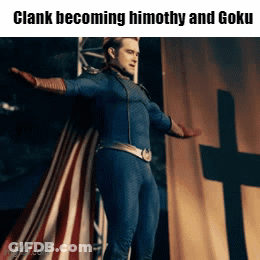Man In Superhero Costume Standing In Front Of Cross GIF
