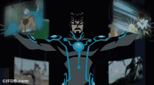 Man In Superhero Costume Surrounded By Pictures GIF