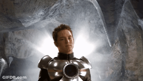 Man In Superhero Costume With Hole In Middle GIF